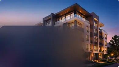 مبنى سكني حديث مضاء عند المساء
